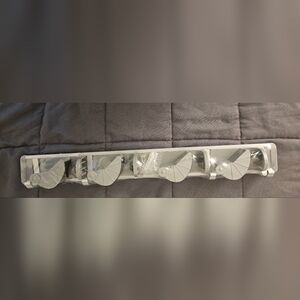 Wall mount for mops brooms ect